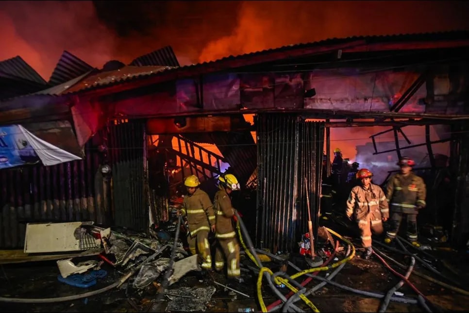 Firefighters responded to a fire that hit a commercial area along Pedro Gil Avenue and affected parts of Paco Catholic School in Manila on April 20, 2024.