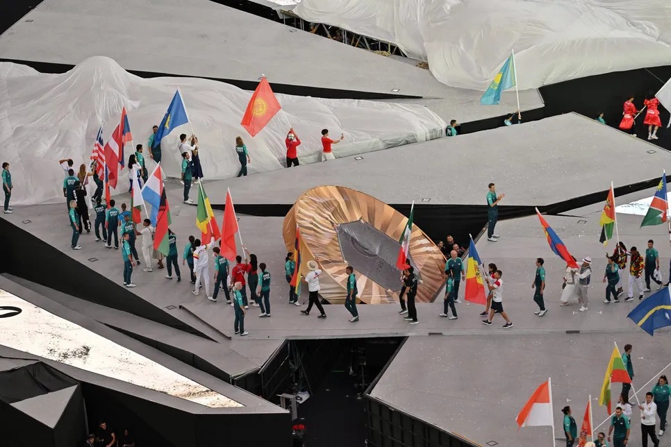 Countries parade during the closing ceremony of the Paris 2024 Olympic Games at the Stade de France, in Saint-Denis, in the outskirts of Paris.