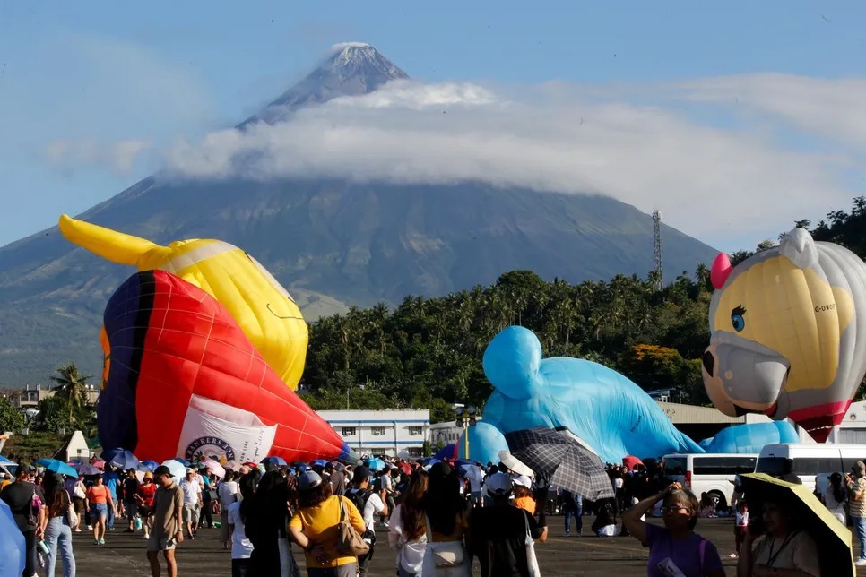 Hot air balloon festival against the backdrop of Mayon Volcano at the first-ever Bicol Loco Hot Air Balloon Festival.
