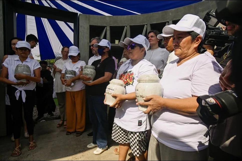 Family and relatives join the inurnment rites of victims of extrajudicial killings linked to the drug war of former President Rodrigo Duterte at the Dambana ng Paghilom in La Loma Cemetery in Caloocan City on Wednesday, May 1, 2024.