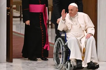 Simple coffin, no elevated platform for Pope's body