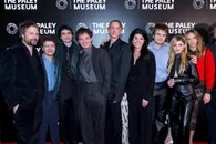 Ross Duffer, Gaten Matarazzo, Finn Wolfhard, Charlie Heaton, Jamie Campbell Bower, Maureen J. Reidy, Joe Keery, Natalia Dyer, and Maya Hawke attend PaleyLive's "Stranger Things" - The Final Season Celebration at The Paley Museum on December 18, 2025 in New York City. Mike Coppola, Getty Images/AFP