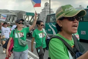 Supporters of former President Rodrigo Duterte walk along parts of Manila on Mar. 28, 2025 to call for his return to the Philippines on his 80th birthday. Job Mahanan, ABS-CBN News
