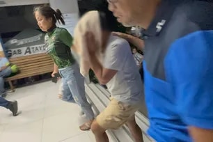 The suspect in a 'gas-and-run' incident arrives at the La Loma Police Station 1, March 30, 2026. Darylle Sarmiento, ABS-CBN News