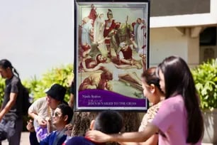Devotees and Catholic faithful offer prayers as they enter the Antipolo Cathedral in Antipolo City on Maundy Thursday, April 2, 2026. Thousands of devotees visit the cathedral yearly, many taking long walks as an act of penance and prayer in observance of Holy Week.  Jonathan Cellona, ABS-CBN News