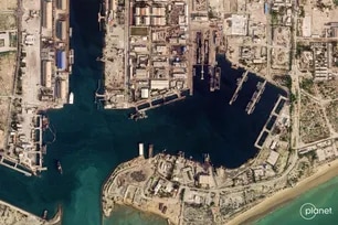 This handout satellite image taken by 2026 Planet Labs PBC shows damage at the military harbor in Iran's southern port of Bandar Abbas along the Strait of Hormuz on March 4, 2026. 2026 Planet Labs PBC via AFP/File