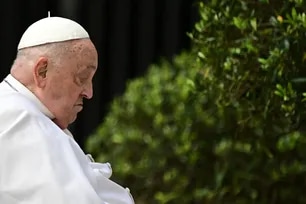Pope Francis makes a surprise appearance at the end of the mass for Palm Sunday at St Peter's square in the Vatican on April 13, 2025. Tiziana Fabi, AFP/File