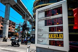 Fuel prices are displayed at a gasoline station in Quezon City on April 7, following another round of fuel price hikes. Oil companies raised gasoline prices by as much as P5.90 per liter and diesel by up to P19.80 per liter, marking one of the largest increases in recent weeks. Maria Tan, ABS-CBN News