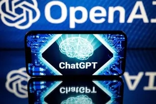 This picture taken on Jan. 23, 2023 in Toulouse, southwestern France, shows screens displaying the logos of OpenAI and ChatGPT. ChatGPT is a conversational artificial intelligence software application developed by OpenAI. Lionel Bonaventure, AFP/File