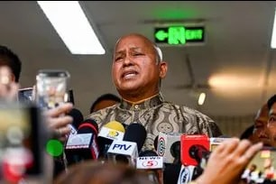 Ronald Dela Rosa speaks to the media during an ambush interview at the Philippine Senate on Wednesday, May 13, 2026, to address ongoing issues pertaining to the ICC arrest warrant. Maria Tan, ABS-CBN News