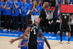 Victor Wembanyama #1 of the San Antonio Spurs drives to the basket during the game against the Oklahoma City Thunder during the Western Conference Finals of the 2026 NBA Playoffs on May 18 2026 at Paycom Center in Oklahoma City, Oklahoma. Morgan Givens, NBAE via Getty Images/AFP