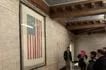 Visitors view the Peace Flag — a US flag bordered in white to represent an alternative to militant patriotism — at the Christian Science Plaza in Boston, Massachusetts. Jonathan de Santos, ABS-CBN News, file