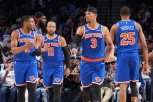 Miles McBride #2, Jalen Brunson #11, Josh Hart #3 and Mikal Bridges #25 of the New York Knicks look on during the game against the Philadelphia 76ers during Round Two Game Three of the 2026 NBA Playoffs on May 8, 2026 at the Wells Fargo Center in Philadelphia, Pennsylvania. Jesse D. Garrabrant, NBAE via Getty Images/AFP 