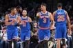 Miles McBride #2, Jalen Brunson #11, Josh Hart #3 and Mikal Bridges #25 of the New York Knicks look on during the game against the Philadelphia 76ers during Round Two Game Three of the 2026 NBA Playoffs on May 8, 2026 at the Wells Fargo Center in Philadelphia, Pennsylvania. Jesse D. Garrabrant, NBAE via Getty Images/AFP 