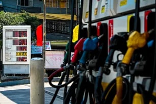 Fuel prices are displayed at a gasoline station in Quezon City on April 7, following another round of fuel price hikes. Oil companies raised gasoline prices by as much as P5.90 per liter and diesel by up to P19.80 per liter, marking one of the largest increases in recent weeks. Maria Tan, ABS-CBN News