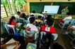 Teacher Rodora Santos facilitates the Literacy Remediation Program for Grades 4 and 5 pupils at Kamuning Elementary School in Quezon City on Wednesday, May 21. The program aims to help struggling readers strengthen their foundational skills. Kamuning Elementary School also officially opens the Fun Field Reading Camp, an engaging summer initiative that combines learning with play to make reading more enjoyable for students. Maria Tan, ABS-CBN News