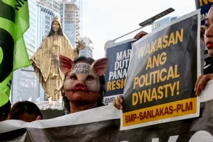 Activists and human rights advocates hold a protest to mark the 40th anniversary of the EDSA People Power Revolution at the EDSA Shrine in Quezon City on February 25, 2026. Jonathan Cellona, ABS-CBN News