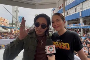 Coco Martin and Julia Montes at the "Sigabo" motorcade, June 6, 2026. Lyza Aquino, ABS-CBN News