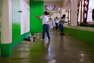 Teachers paint and decorate their classrooms in preparation for the upcoming school opening at Kapitbahayan Elementary School in Navotas City on June 2, 2026.
