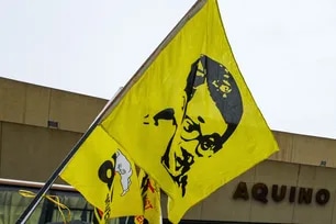 Members of the August Twenty-One Movement (ATOM) and the National Historical Commission of the Philippines (NHCP) hold a wreath-laying ceremony outside Terminal 1 of the Ninoy Aquino International Airport (NAIA) in Paranaque City on Thursday, August 21, 2025, to mark the 42nd death anniversary of Senator Benigno “Ninoy” Aquino Jr. Maria Tan, ABS-CBN News