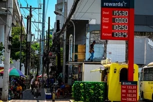 Fuel prices are displayed at a gasoline station in Quezon City on April 7, following another round of fuel price hikes. Oil companies raised gasoline prices by as much as P5.90 per liter and diesel by up to P19.80 per liter, marking one of the largest increases in recent weeks. Maria Tan, ABS-CBN News