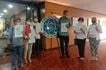 Members of the Alliance of Health Workers with Atty. Antonio La Viña of Movement Against Disinformation file a complaint against Lorraine Badoy-Partosa in April 2022. Alliance of Health Workers Facebook page
