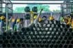 Workers are seen at the Precast Concrete Yard in Santa Rosa, Laguna on June 13, 2024. The factory is in full swing as they produce concrete parts which will then be assembled to finish the South Commuter Railways Jonathan Cellona, ABS-CBN News