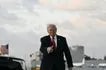US President Donald Trump gives a thumbs up upon arrival at Miami International Airport in Miami, on April 11, 2026.