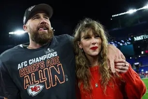 Travis Kelce of the Kansas City Chiefs (L) celebrates with Taylor Swift after defeating the Baltimore Ravens in the AFC Championship Game at M&T Bank Stadium on January 28, 2024 in Baltimore, Maryland. Patrick Smith, Getty Images/AFP/File