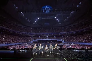 K-pop group EXO takes a photo with the crowd during the first night of the two-night Manila stop of its "EXO PLANET #6 – EXhOrizon" tour at the SM Mall of Asia Arena on July 4, 2026. Photo from EXO's X account