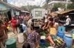 Residents line up to fill buckets and drums from a water tanker amid a water crisis in Real, Quezon, July 5, 2026. Dennis Datu, ABS-CBN News