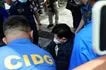 Embattled Senator Rodante Marcoleta, wearing a detainee shirt under a bulletproof protective vest and hands in handcuffs, arrives in a wheelchair heavily secured by police escorts at the University of the Philippines–Philippine General Hospital (UP-PGH) in Manila on Tuesday, July 14, 2026.
