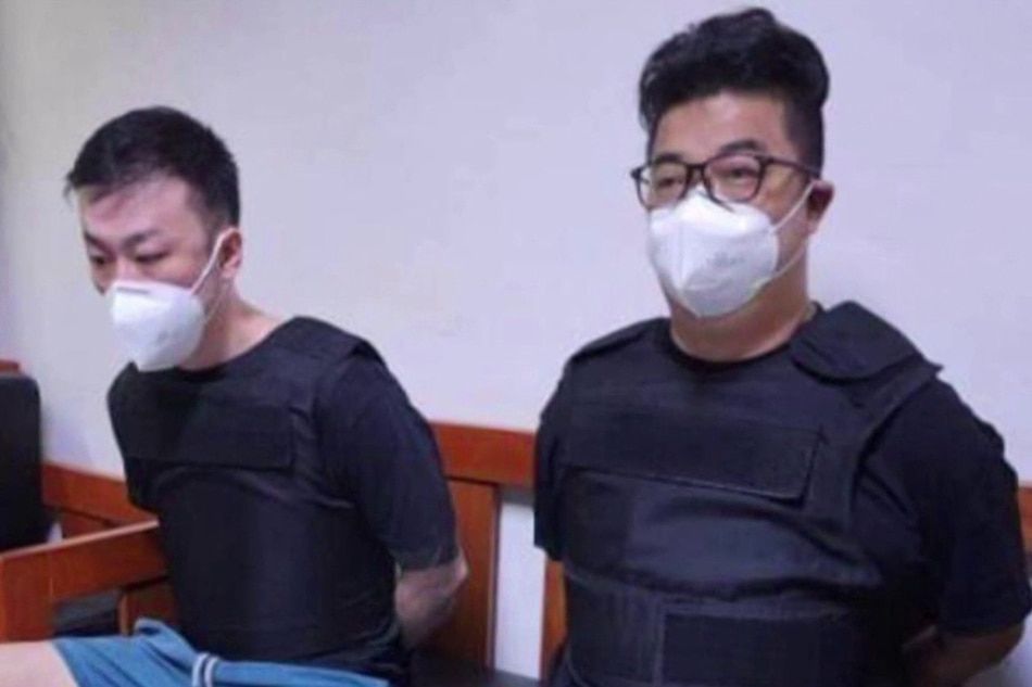 Toshiya Fujita (L) and Kiyoto Imamura (R), suspected members of the 