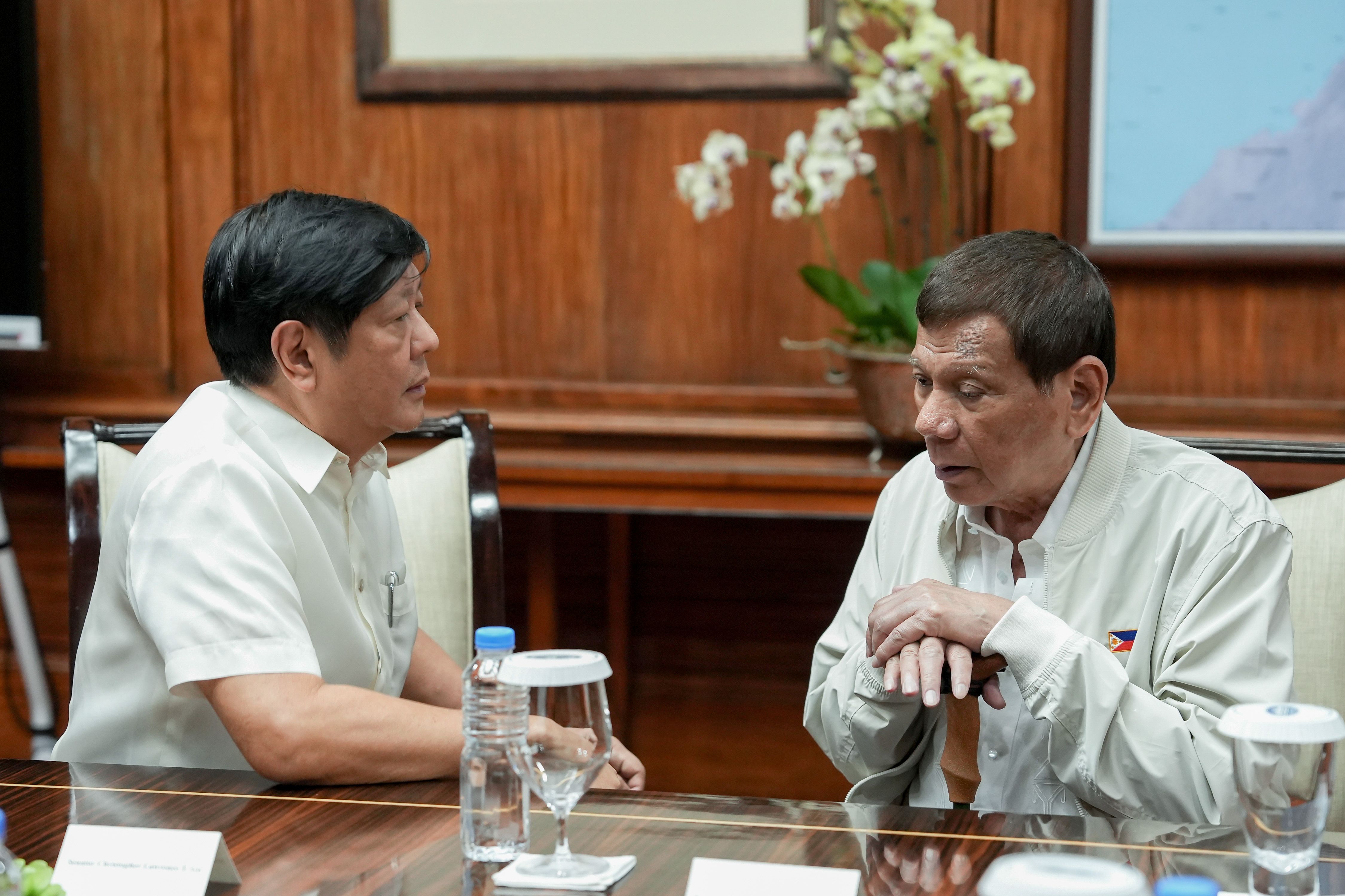 Then President Rodrigo Duterte discusses matters with his future successor Ferdinand Marcos Jr. during a meeting at the Malago Clubhouse in Malacañang on Sept. 16, 2020. King Rodriguez, Presidential Photo/File