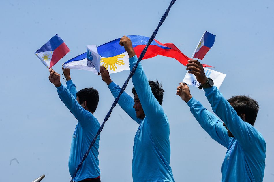 Fisherfolk on small bancas join volunteers from the Atin Ito Coalition and members of the media as they prepare to depart from Matalbis Port in Masinloc, Zambales, for the second civilian resupply mission to the West Philippine Sea on May 16, 2024. Maria Tan, ABS-CBN News/File