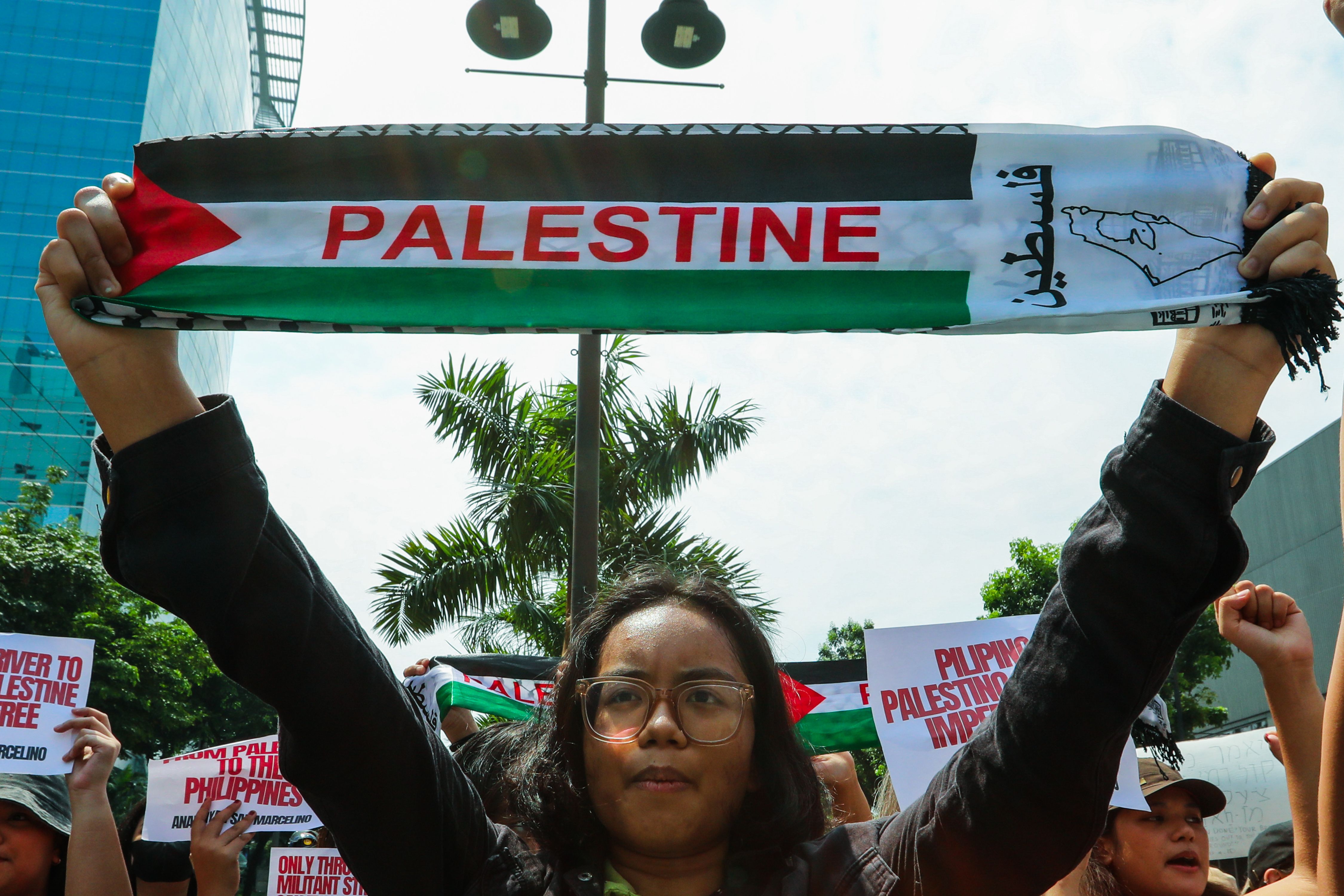 Members of various multi-sectoral groups march and protest in Bonifacio Global City, Taguig City where the Israeli Embassy is located on June 8, 2024 to condemn Israel’s ongoing operations in Palestine which has killed more than 36,000, including children. Maria Tan, ABS-CBN News