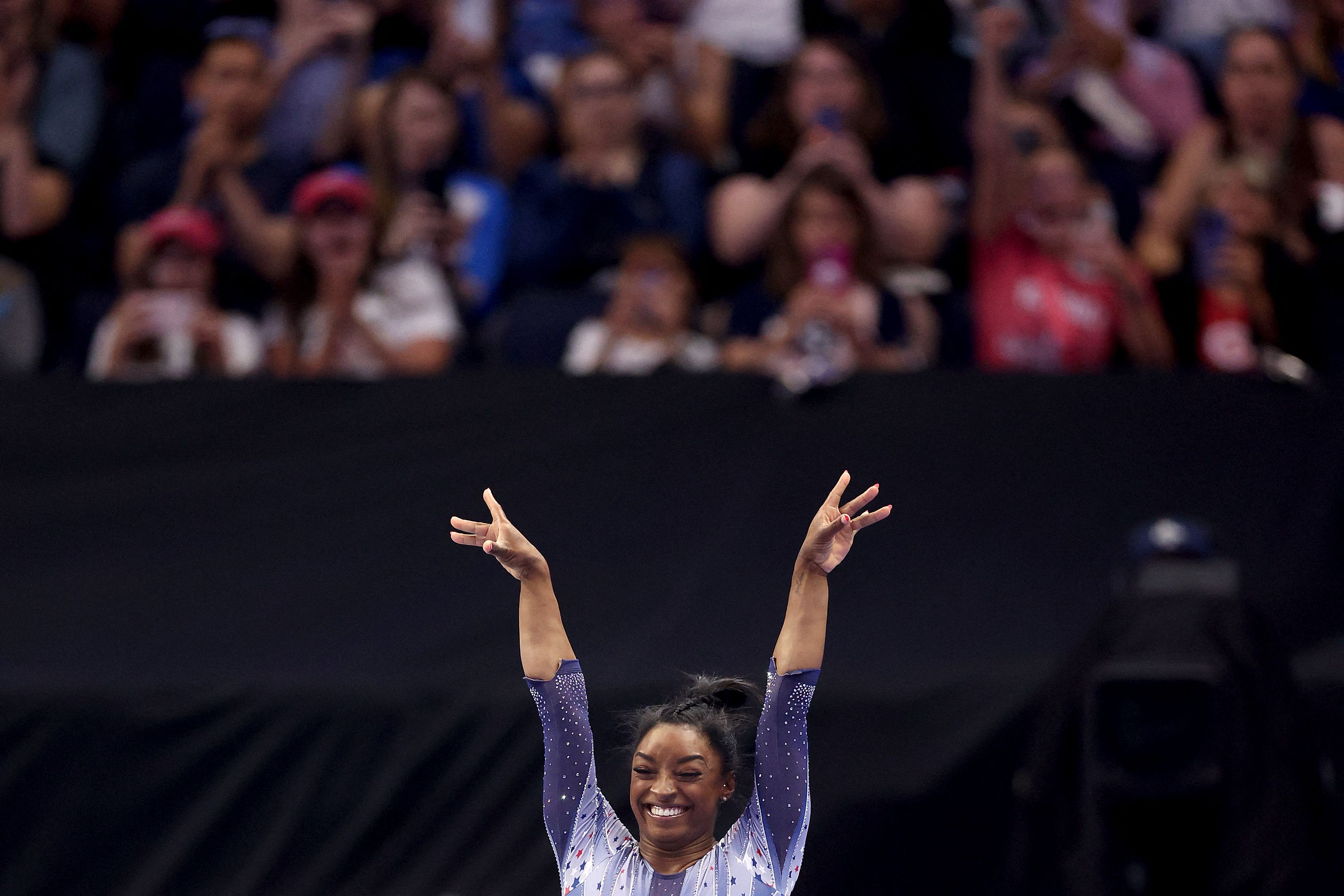 Simone Biles celebrates after competing in the vault routine on Day Two of the 2024 U.S. Olympic Team Gymnastics Trials at Target Center on June 28, 2024 in Minneapolis, Minnesota. Jamie Squire, Getty Images/AFP
