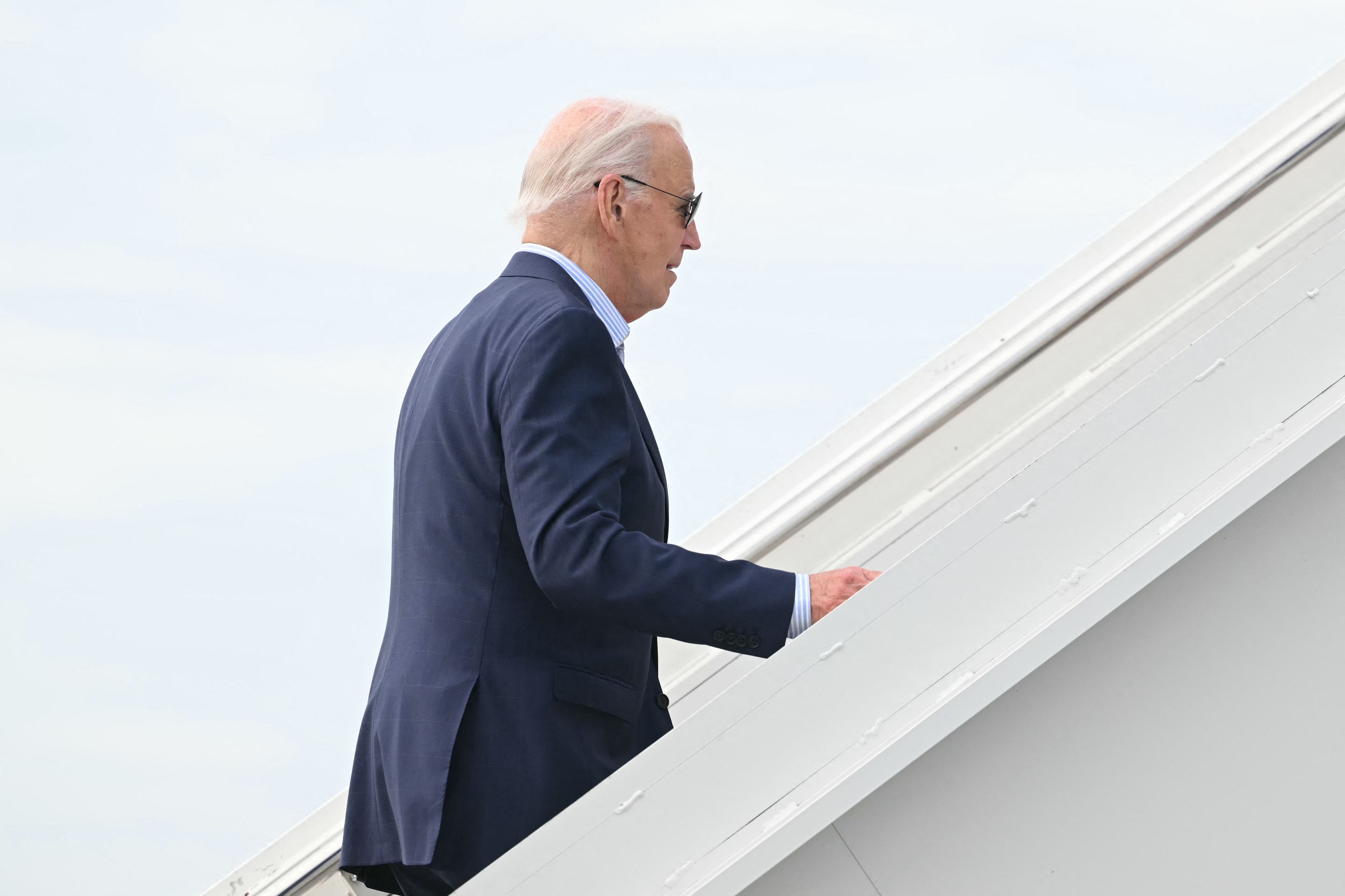 US President Joe Biden boards Air Force One upon arrival at Francis S. Gabreski Airport in Westhampton Beach, New York on June 29, 2024. Photo by Mandel Ngan/AFP