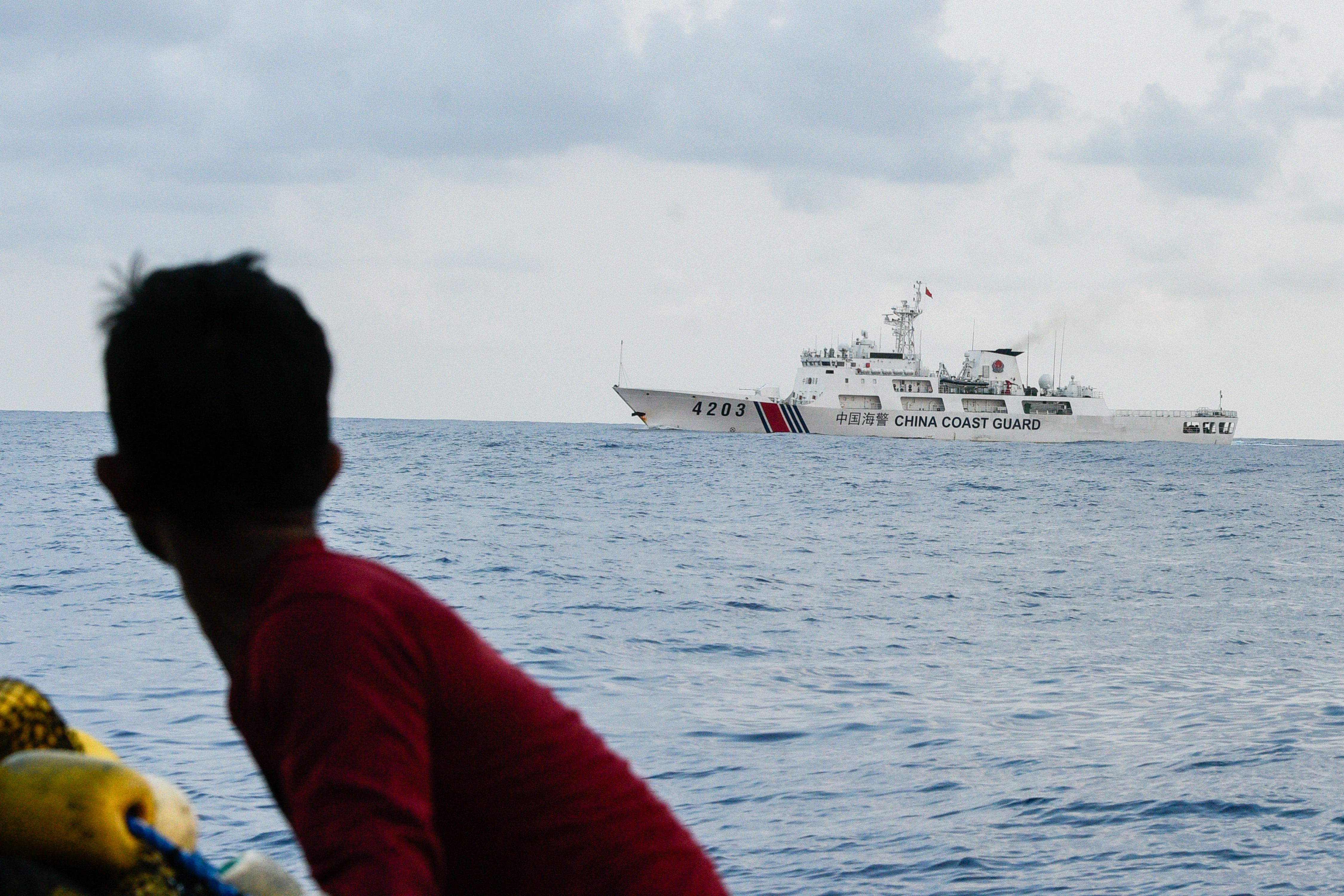 The presence of the China Coast Guard (CCG) persists despite the effort of the Philippine Coast Guard (PCG) to block them and assist the four main vessels of the second civilian resupply mission of the Atin Ito Coalition to the Bajo de Masinloc or Panatag Shoal in the West Philippine Sea on May 15, 2024. Maria Tan, ABS-CBN News/File