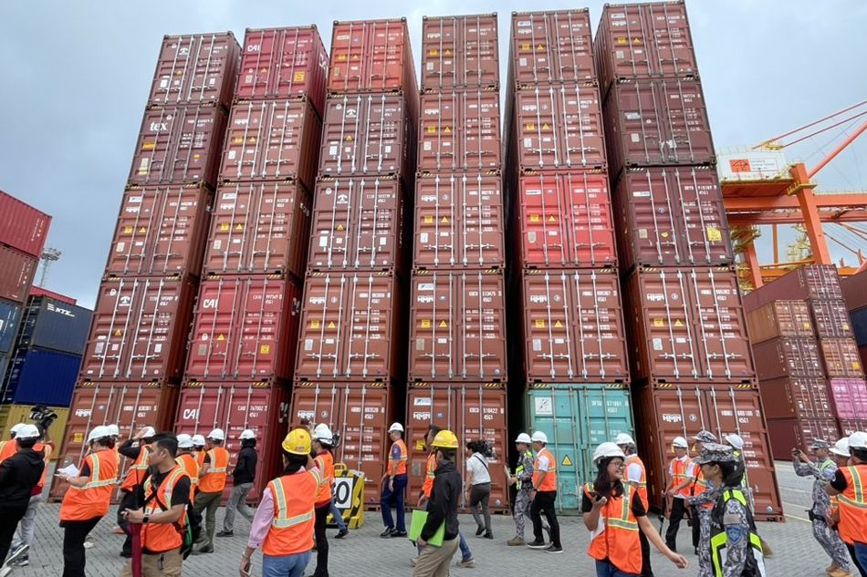 Almost half a million sacks of rice in more than 800 shipping containers remain uncollected at the Manila International Container Port. Jervis Manahan, ABS-CBN News