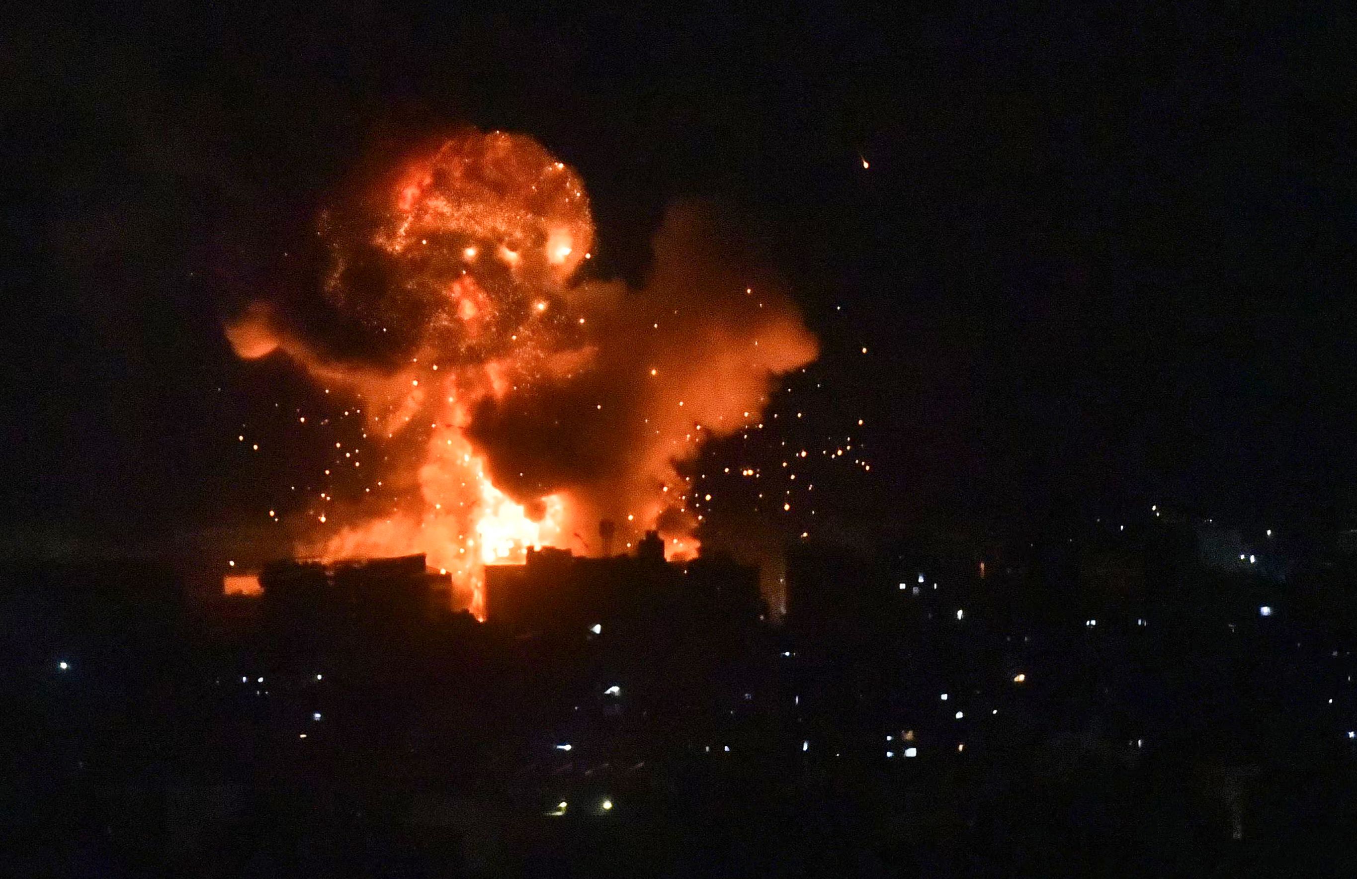 Flames and smoke rise in an area targeted by an Israeli air strike on Beirut's southern suburbs, October 6, 2024. Fadel Itani, AFP/File