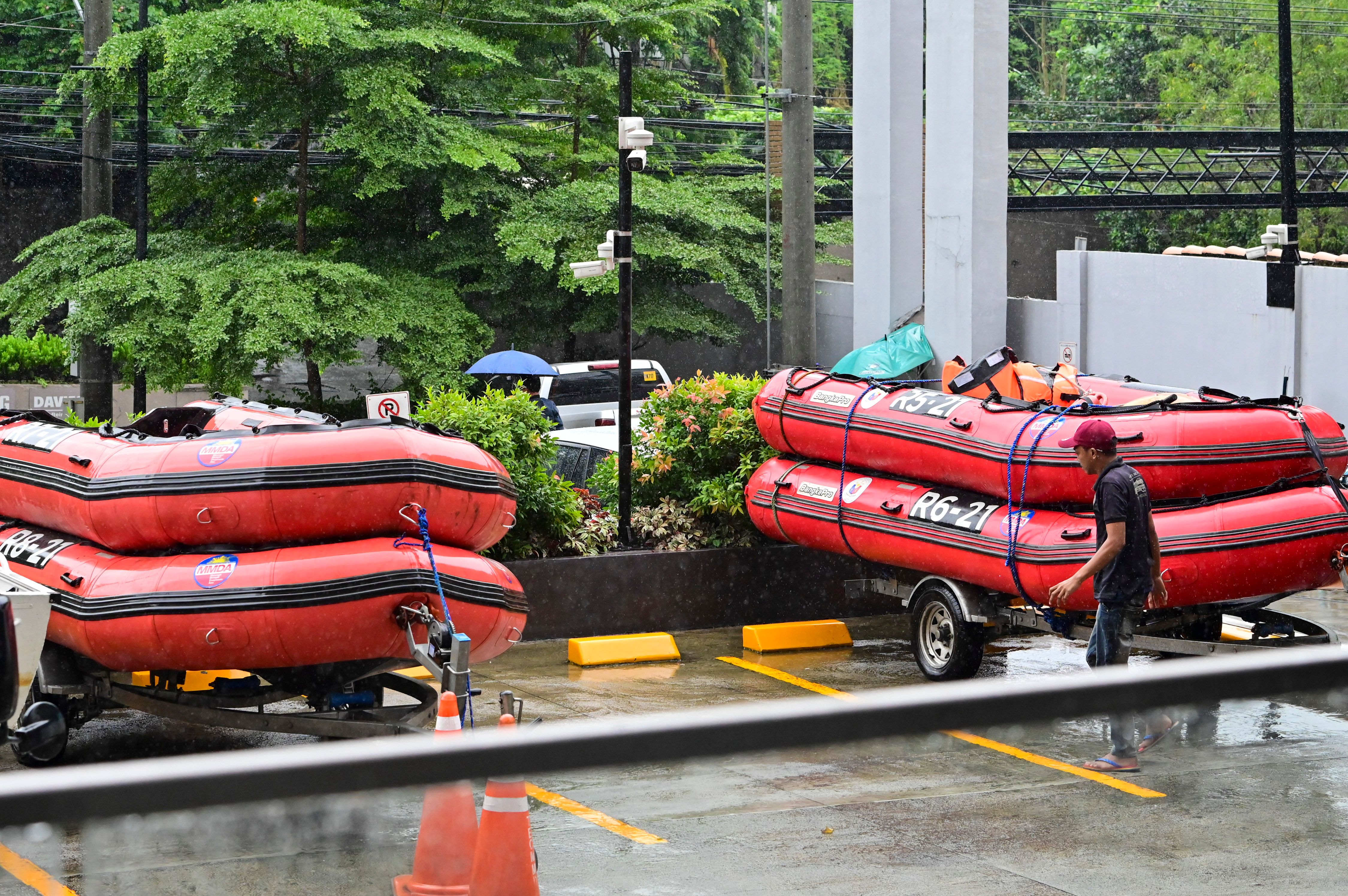 Metropolitan Manila Development Authority personnel check the readiness of rescue equipment at the MMDA office in Pasig City in preparation for possible deployment on October 23 as Tropical Storm Kristine batters parts of the country. Maria Tan, ABS-CBN News/File