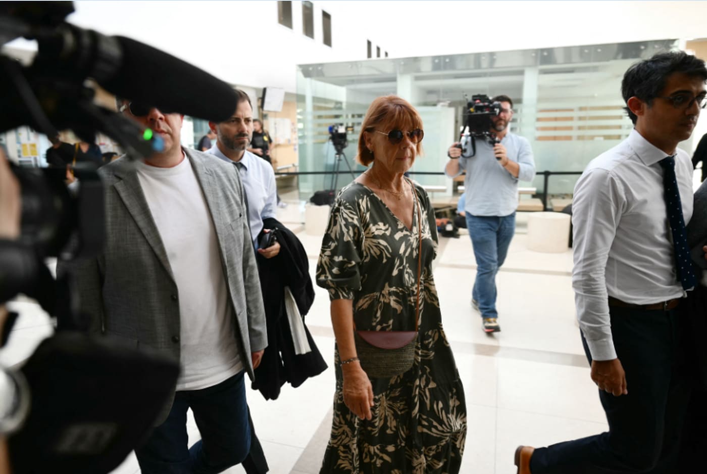 Gisele P. (C) arrives at the courthouse during the trial of her husband accused of drugging her for nearly ten years and inviting strangers to rape her at their home in Mazan, a small town in the south of France, in Avignon, on September 2, 2024. Christophe Simon, AFP