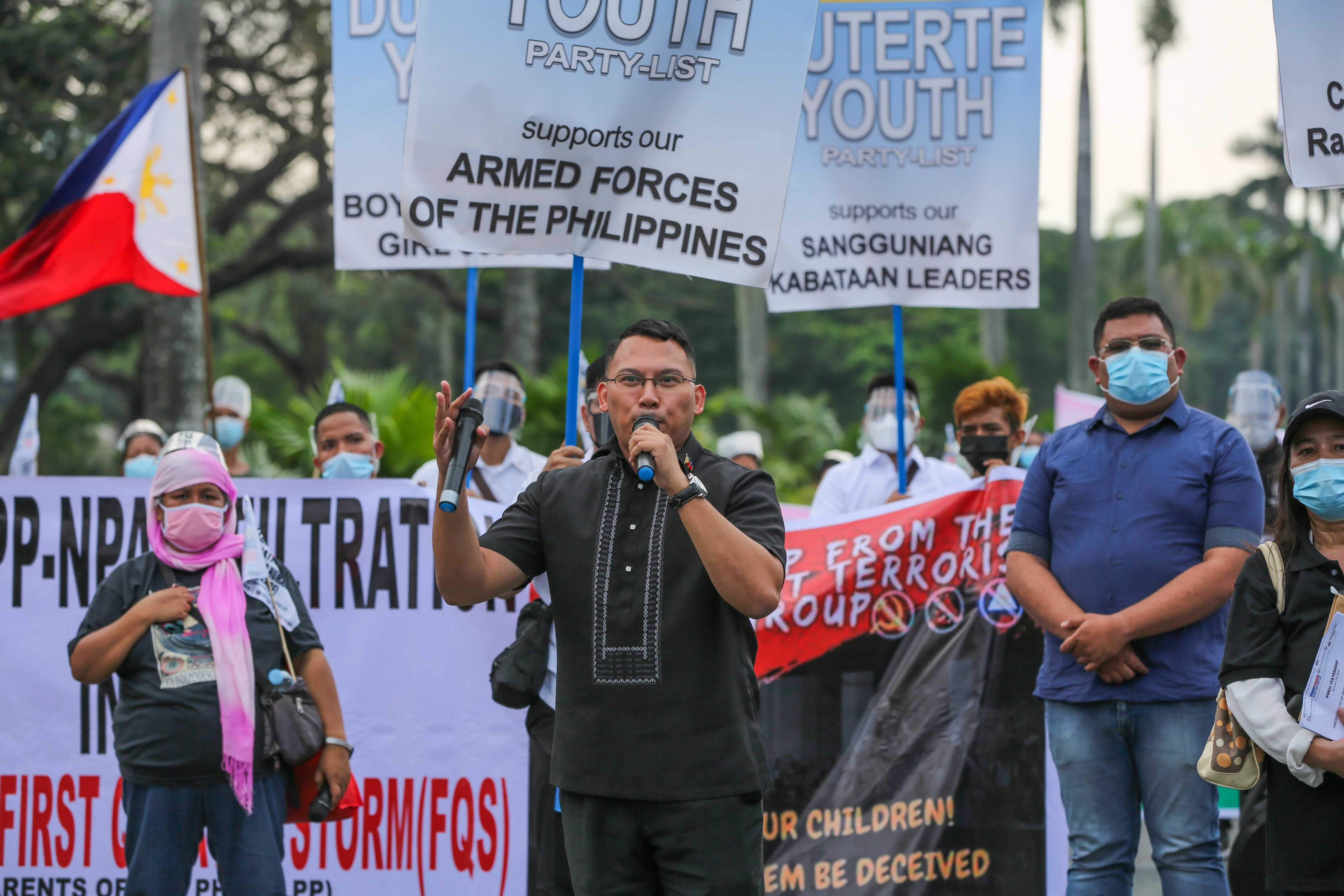 Ronald Cardema speaks as members of the League of Parents of the Philippines (LPP) and the Duterte Youth march near the University of the Philippines (UP) University Avenue in Diliman Quezon City on January 26, 2021. Jonathan Cellona, ABS-CBN News/File