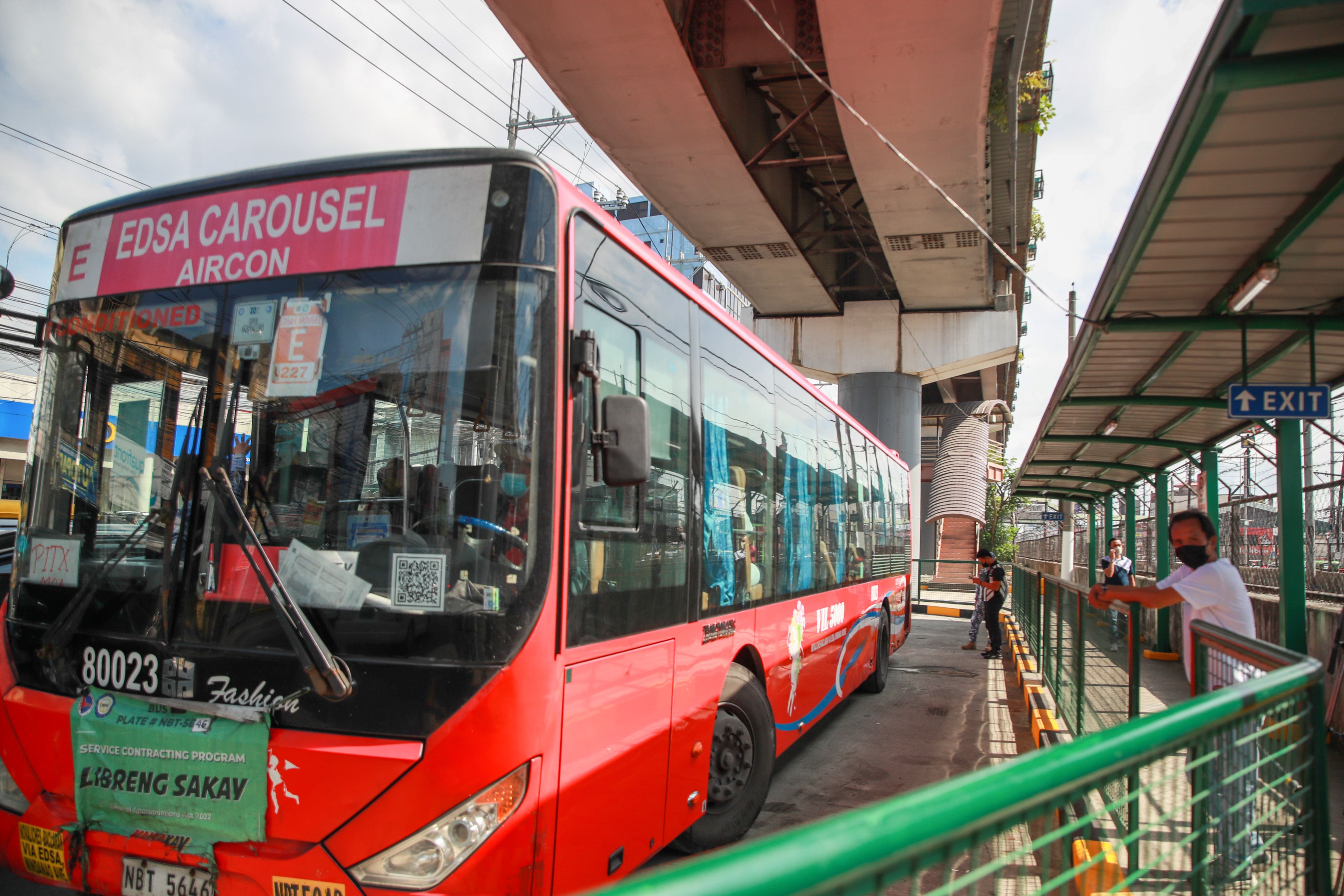 Commuters use the Tramo Busway terminal near the MRT Pasay/EDSA Station in Pasay City on December 28, 2022. Jonathan Cellona, ABS-CBN News/File