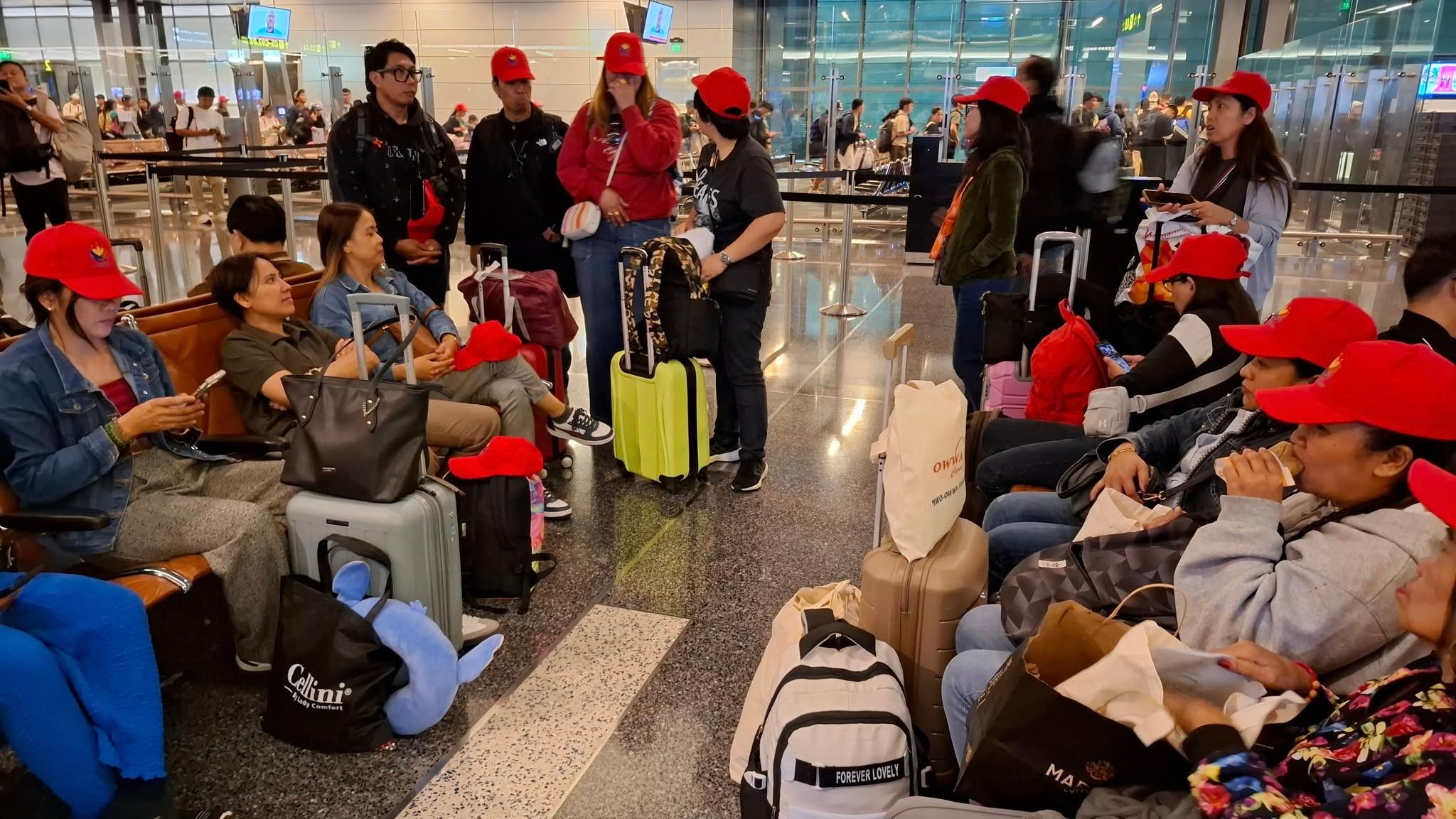 Commercial repatriation flight of 31 OFWs at Doha Hamad International Airport. Photo courtesy of Hans Leo J. Cacdac/Facebook