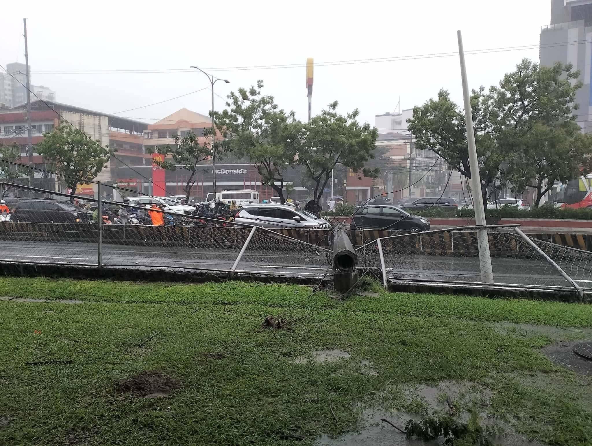 A fallen electric post has rendered the northbound lane of the C5-Katipunan Road in Quezon City impassable to traffic. MMDA release