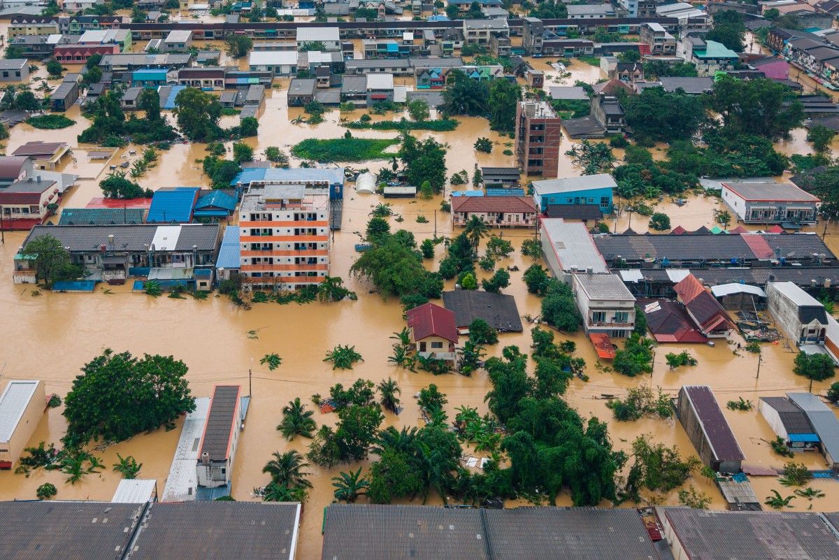 Thailand, Indonesia begin clean-up after massive floods kill hundreds | ABS-CBN News